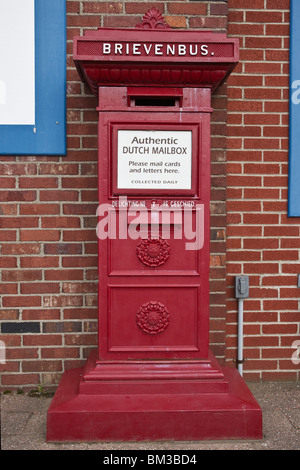 Tulip time festival Dutch Holland Michigan in USA  An authentic historic Dutch mailbox on red bricks wall background trade fair hi-res Stock Photo