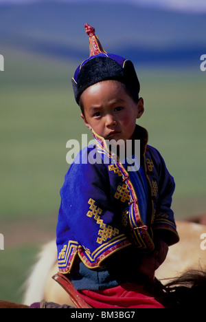 Boy on a horse, Mongolia Stock Photo