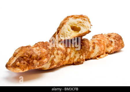 Cheese Twist Pastry from low perspective isolated against white background Stock Photo