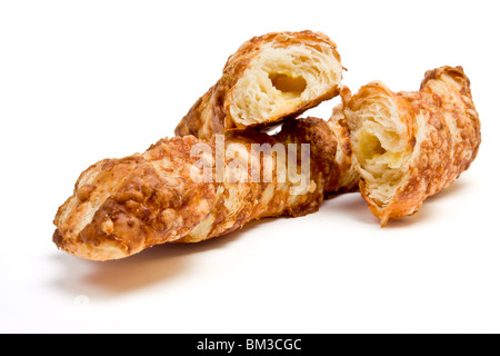 Cheese Twist Pastry from low perspective isolated against white background Stock Photo