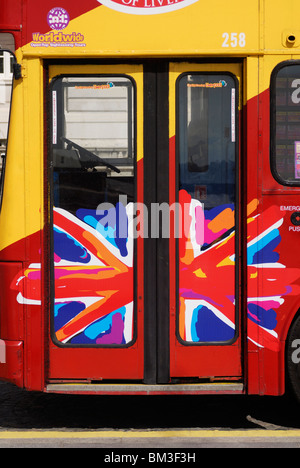 The Union flag, also known as the Union Jack, painted on a tour bus door in Liverpool. Stock Photo