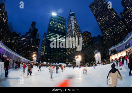 United States of America, New York, New York City, Manhattan, Ice Skating rink in Bryant Park at Christmas Stock Photo