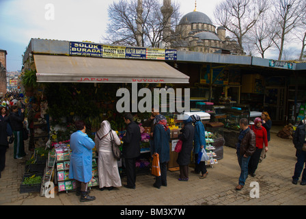 People shopping at Spice Bazaar outside Yeni Camii mosque Sultanahmet Istanbul Turkey Europe Stock Photo