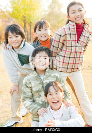 Portrait of five smiling girls Stock Photo - Alamy