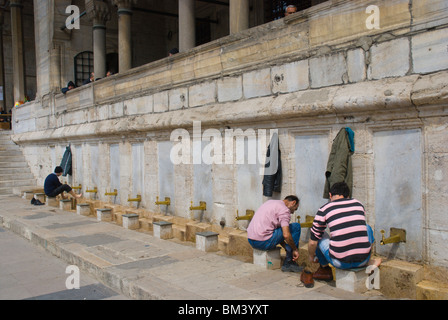 Wudu the washing area of Yeni (New) Camii mosque Sultanahmet Istanbul Turkey Europe Stock Photo