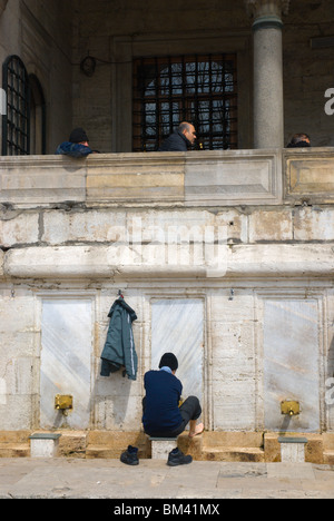 Wudu the washing area of Yeni (New) Camii mosque Sultanahmet Istanbul Turkey Europe Stock Photo