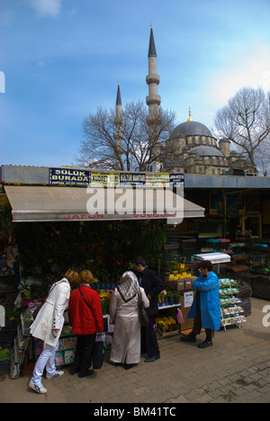People shopping at Spice Bazaar outside Yeni Camii mosque Sultanahmet Istanbul Turkey Europe Stock Photo