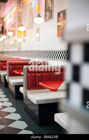 1950's style restaurant with checkered floor and rock'n'roll memorabilia. Stock Photo