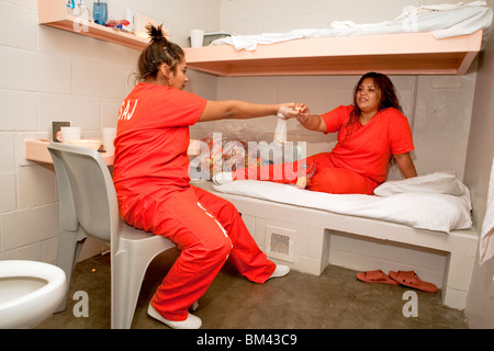 Hispanic inmates share a two-person cell in the female unit of the ...