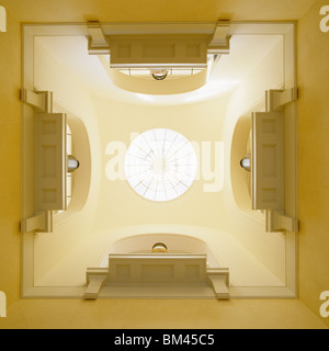 View looking up towards a circular skylight in a new-built neo-classical villa designed by John Simpson Stock Photo