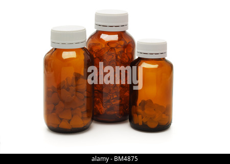 Three bottles of health supplements on white background Stock Photo
