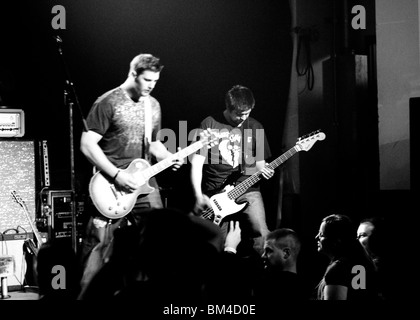 Rock and Roll band guitarist and bass player on stage Stock Photo