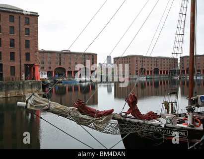 Albert Docks, Liverpool, Merseyside, England, with Liverpool Cathedral in the background Stock Photo