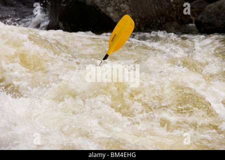 Whitewater kayaking Dragon's Tooth rapid on the Deerfield River in Rowe, Massachusetts.  Dryway run.  Class IV. Stock Photo