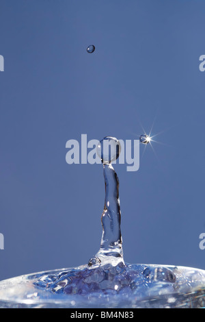 Falling Out Drop water drops falling out of a fountain Stock Photo - Alamy