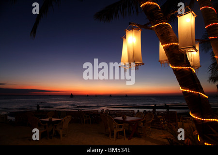 Sunset on White Beach, Boracay, the most famous tourist destination in the Philippines. Stock Photo
