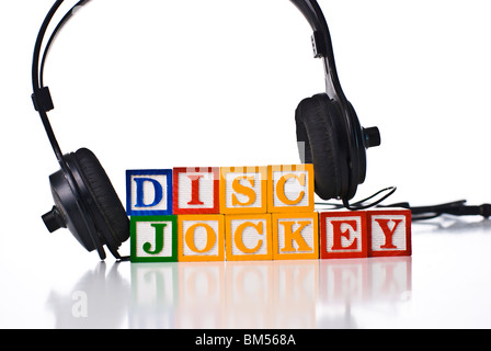 Colorful children's blocks spelling DISC JOCKEY with a set of headphones Stock Photo