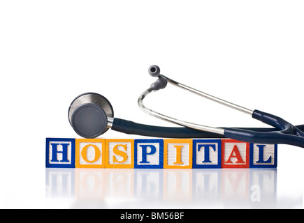 Colorful children's blocks spelling HOSPITAL with a stethoscope Stock Photo