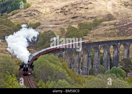 Black Five steam engine No. 45231 pulls the first Jacobite of the season over the famous Glenfinnan Viaduct en route to Mallaig Stock Photo