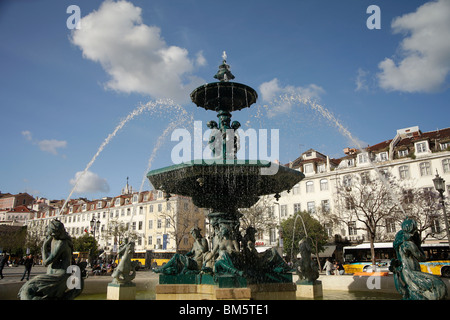fountain on the square Praca de Dom Pedro IV or Rossio in Lisbon, Portugal, Europe Stock Photo
