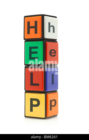 Colorful alphabet blocks stacked to form the word HELP Stock Photo