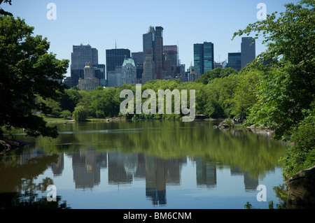 The New York City skyline reflected in Central Park Lake in New York on Thursday, May 20, 2010. (© Frances M. Roberts) Stock Photo