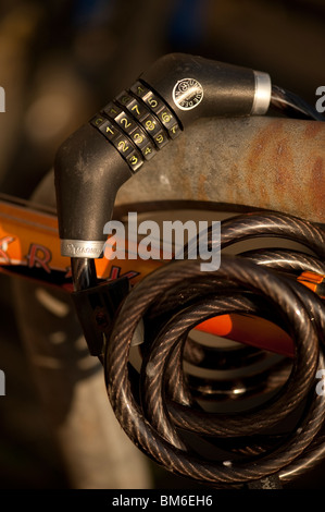 Combination lock padlock on a bicycle, UK Stock Photo