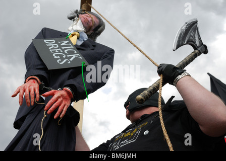 The effigy of Liberal Democrat leader Nick Clegg being hung by the executioner on Parliament Square on May Day. Stock Photo