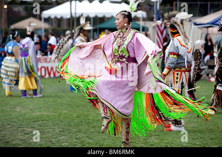 LOS ANGELES - MAY 2: American Indian woman dancing at the 24th Annual UCLA Pow Wow in Los Angeles on May 2nd, 2009. Stock Photo