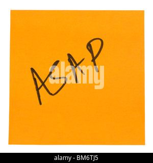 Word ASAP written on an adhesive note Stock Photo