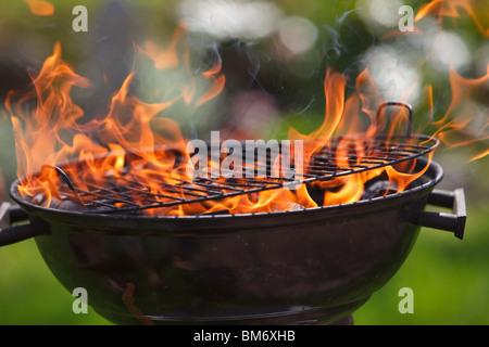 Grill in flames close-up Stock Photo