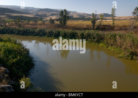 The Jordan river flowing at the northern Jordan valley  Israel Stock Photo