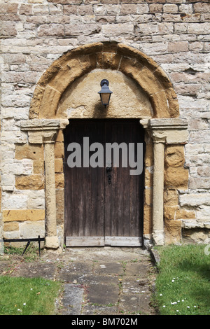 The Norman South Door, St Mary's Church, Halford, Warwickshire, England Stock Photo