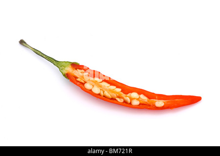 cut open red birds eye chilli on a white background Stock Photo