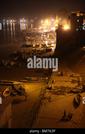 Night view of the ghats and riverside of The Ganges in Varanasi in India. Stock Photo