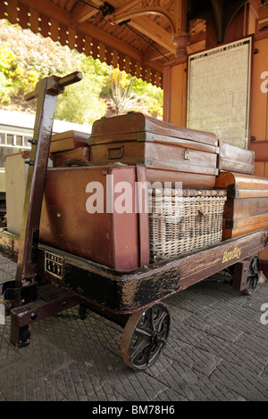 Old suitcases on a porters trolley at Bewdley Railway Station part of the Severn Valley Steam Railway Worcestershire UK