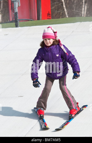 Child Learning to Ski at the Dry Ski Slope in Warmwell Dorset UK Stock Photo