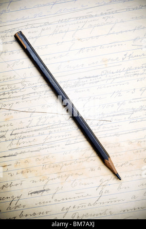 pencil on a vintage letter page Stock Photo
