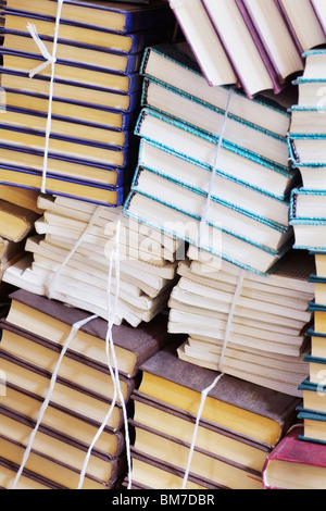 Stacks of tied up books Stock Photo