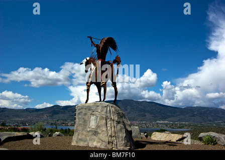 Magnificent Smoker Marchand outdoor metal sculpture of native aboriginal on horseback at entrance Nk'Mip Desert Cultural Centre Stock Photo