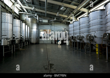 Huge empty stainless steel wine fermentation tanks in Tantalus Vineyards Winery cellar Okanagan Valley Kelowna BC Canada Stock Photo