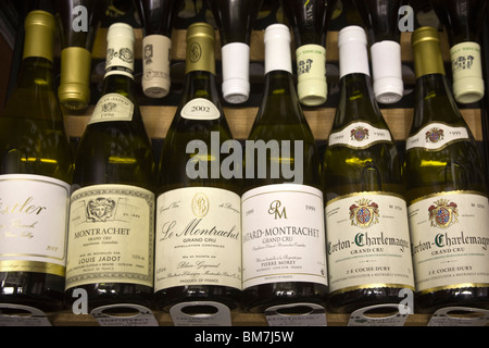 A Selection of Fine Montrachet Wine in Eurocave Storage Cabinet Stock Photo