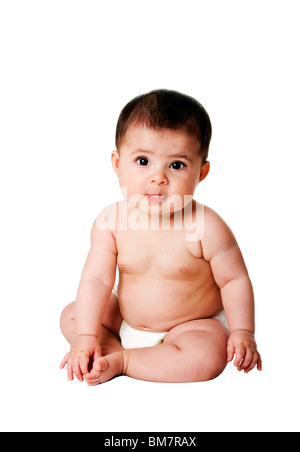 Beautiful cute happy Caucasian Hispanic baby infant sitting, wearing white diaper, isolated. Stock Photo