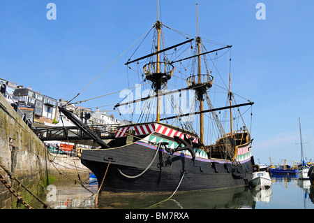 a replica of the golden hind sailing ship in the harbour at brixham, devon, uk Stock Photo