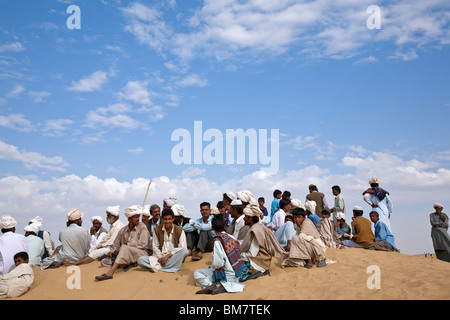 Indian men resting. Sam Sand Dunes National Park. Near Jaisalmer. Rajasthan. India Stock Photo