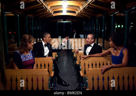 Barack and Michelle Obama with President Felipe Calderón of Mexico, and his wife, Mrs. Margarita Zavala on a trolley Stock Photo