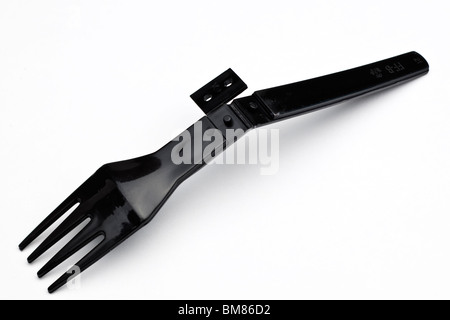 Black plastic fold away fork Stock Photo
