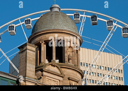 Architectural detail of The Triangle Shopping Centre behind is The Wheel of Manchester and the Arndale centre Stock Photo