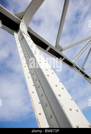 Riveted steel beam at a steel bridge support structure Stock Photo