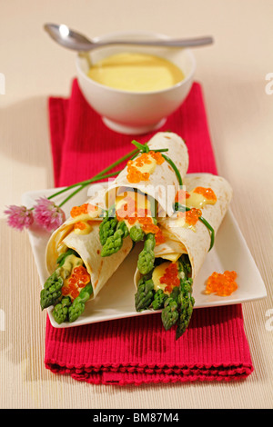 Fajitas with asparagus and caviar. Recipe available. Stock Photo